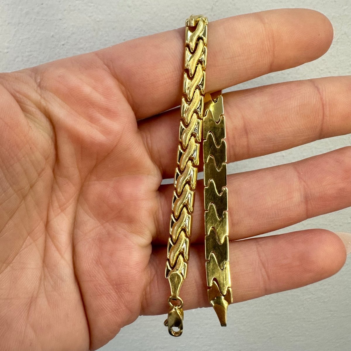 Ledat armband tillverkad i 18 karat guld - Smyckesbanken