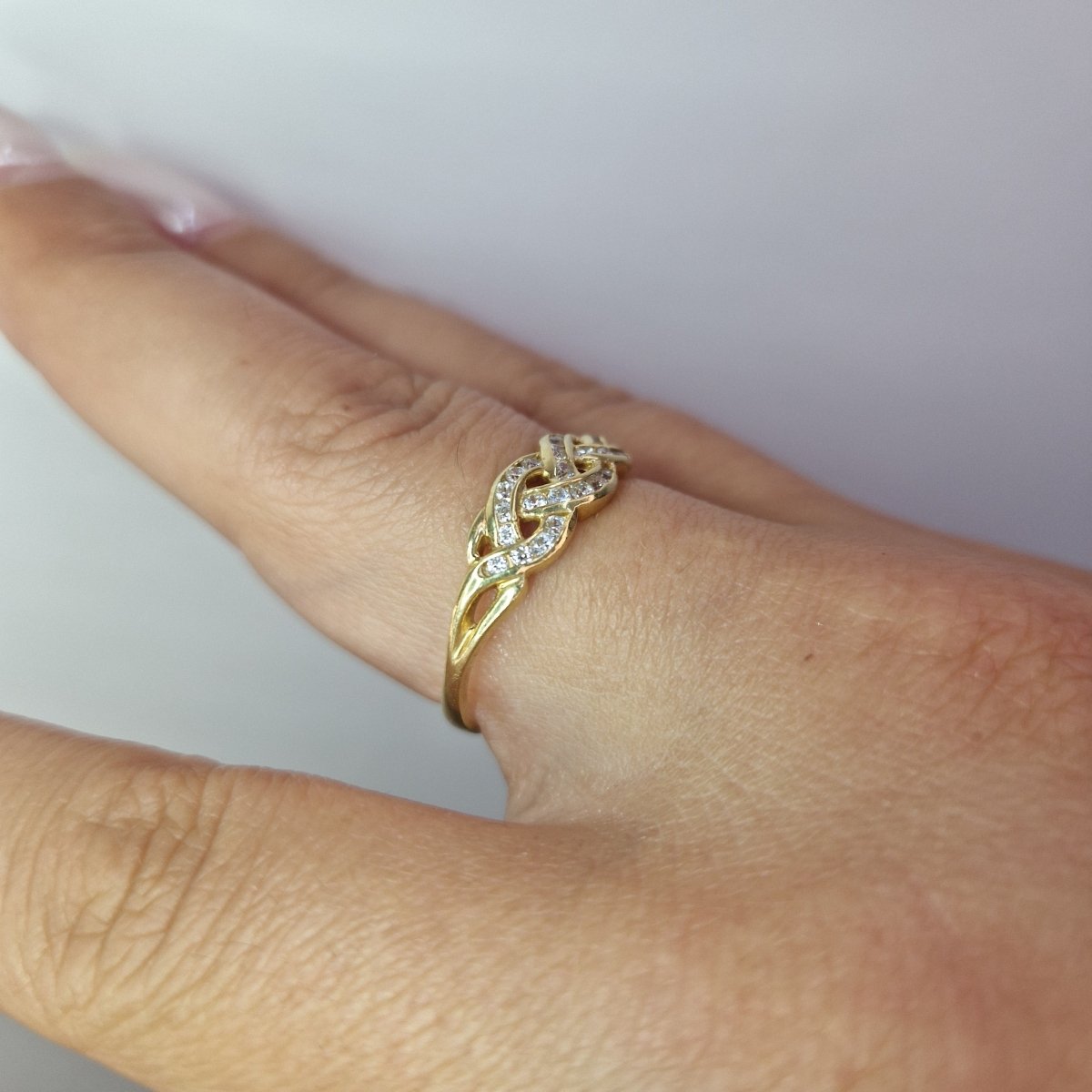 Ring flätad design 18k guld - Smyckesbanken