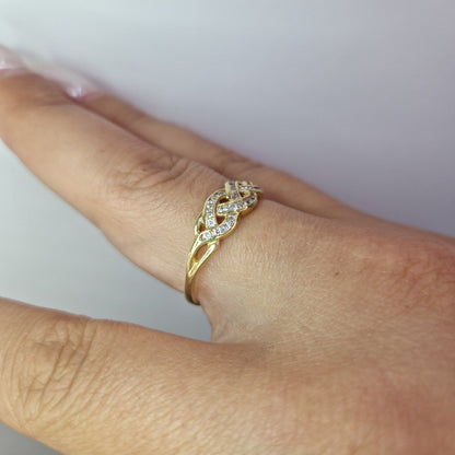 Ring flätad design 18k guld - Smyckesbanken