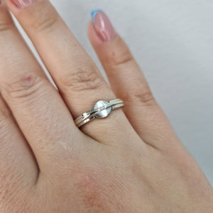 18K vitgulds ring med en diamant - Smyckesbanken