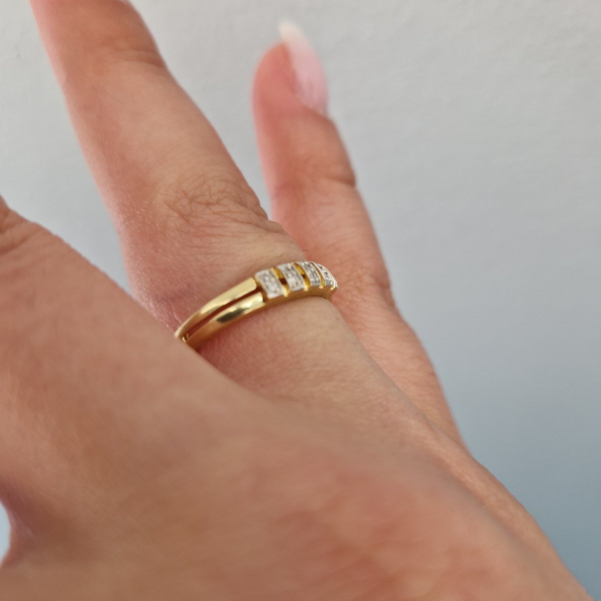 Ring i 18k med 10 diamanter 