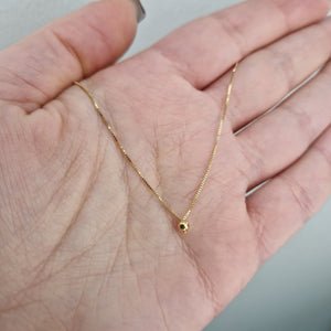 Halsband 18k guld med en liten kula - Smyckesbanken