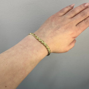 Ledat armband tillverkad i 18 karat guld - Smyckesbanken
