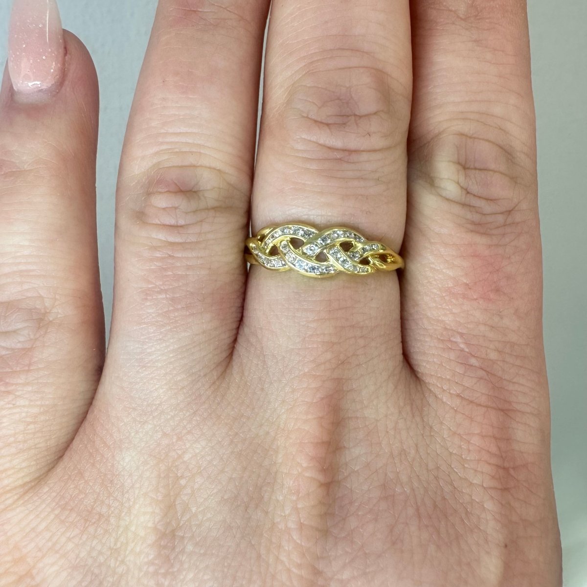 Ring flätad design 18k guld - Smyckesbanken